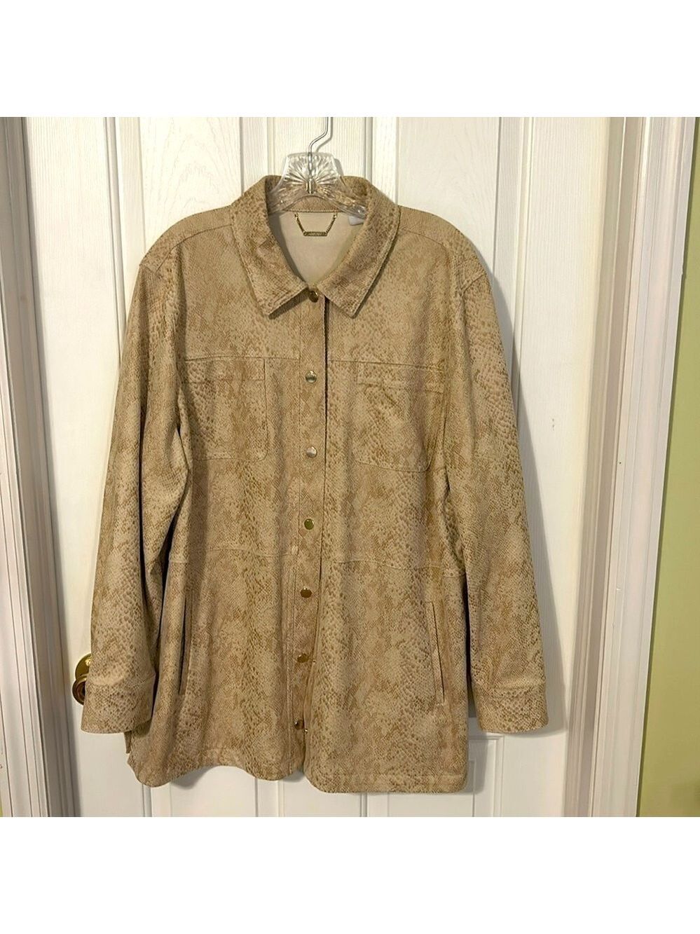 Chico’s faux leather jacket. Ladies Chico’s size 4 (XL)Long sleeves. Snake print